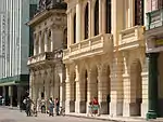 Historic eclectic buildings serving as Cultural Centre and radio station, facing the park