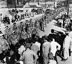 2nd Battalion, 5th Gurkha Rifles marches through Kure, May 1946.