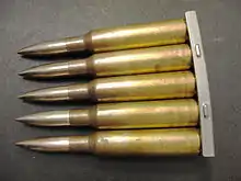 Stripper clip loaded with Swedish 6.5×55mm surplus FMJ spitzer ammunition produced in 1976.