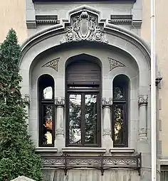 Romanian Revival cartouche above a window of the Aurel Mincu House (Bulevardul Dacia no. 60), Bucharest, by Arghir Culina, 1910