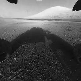 Curiosity landed on August 6, 2012, about 10 km from the base of Mount Sharp).