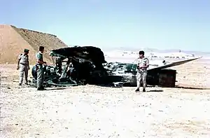 Israeli troops examine a destroyed Egyptian MiG-21 in the Sinai Peninsula, June 1967