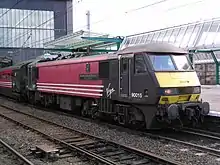 90015 "The International Brigade Spain 1936-1939" at Carlisle on 27 August 2004 on the final Class 90-hauled service for Virgin Trains until 2007.