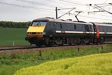 An InterCity 225 at speed on the East Coast Main Line in Nottinghamshire, view on a Class 91 locomotive