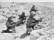 Image 34Australian infantry at Tobruk during World War II. Beginning on 10 April 1941, the Siege of Tobruk lasted for 240 days. (from History of Libya)