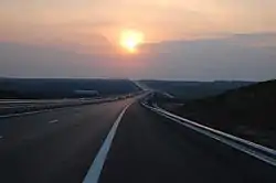 Photograph of a motorway at sunset.