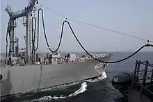 JS Tokiwa refueling with USS Decatur on 15 March 2006.