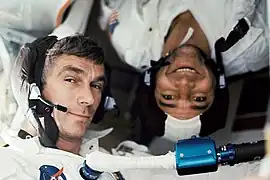 Plantronics (SPENCOM) headsets in use by NASA Astronauts Evans and Cernan, both wearing "Snoopy" caps, aboard the Apollo 17 spacecraft.