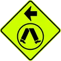 (W6-V2-2) Pedestrian Crossing Ahead on Side Road (turn left) (Used in Victoria and South Australia)