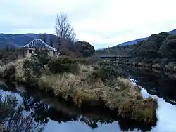 Bullock's Flat homestead and Skitube railway bridge, Thredbo River (right) and Little Thredbo (left).