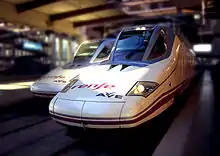 A Talgo 350 train (Renfe Class 102) at Madrid Atocha station.