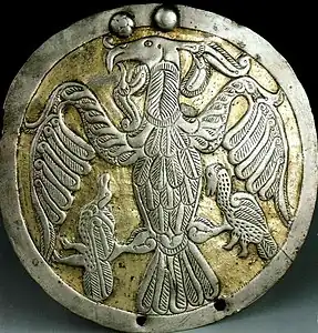 A pair of silver hair decoration disk with motive of mythic Turul bird from a 10th century Hungarian cemetery (Found in Rakamaz, Hungary) Jósa András Museum in Nyíregyháza, Hungary