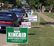 A row of yard signs