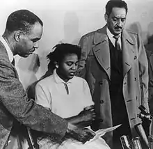 Roy Wilkins in press conference with Autherine Lucy  and Thurgood Marshall, director and special counsel for NAACP Legal Defense and Education Fund]. Autherine Lucy was the first African-American student to attend the University of Alabama who later expelled her.