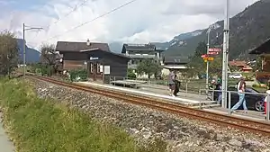 Wooden shelter on side platform