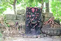 Atbaichandi idol in what remains of a temple