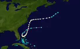 The track of a major hurricane starts south of Bermuda, loops north near the Bahamas, and reaches peak intensity near the Carolinas before moving out to sea.