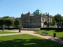 Bibliothèque nationale et universitaire at Strasbourg, stone building with portico by a park