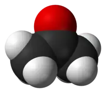 A ball structure of a molecule. Its backbone is a zig-zag chain of three carbon atoms connected in the center to an oxygen atom and on the end to 6 hydrogens.