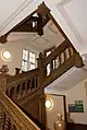 The main staircase from the ground floor showing the open helices in the balustrade.