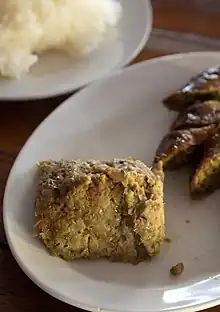 Aep ong-o a northern Thai dish of chopped pig's brain mixed with egg and a Thai curry paste. It is wrapped in banana leaves and grilled