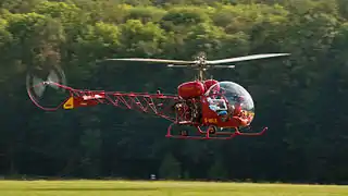 Bell 47G helicopter with its distinctive "soap-bubble" canopy