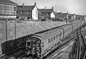 An LMS 630v EMU approaching in 1959.