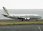 Air Austral's 1975–1990 livery on a Boeing 737-500.