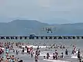 Image 3Beachgoers and an air show at Puntarenas, 2013