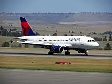 Image 14An Airbus A319 waits at Billings Logan International Airport. (from Transportation in Montana)