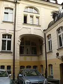 Courtyard, with an oeil-de-boeuf on the right roof