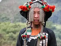 Image 37Akha girl in traditional dress (from Culture of Laos)