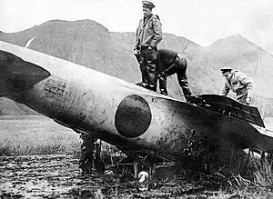 The Akutan Zero is inspected by US military personnel on Akutan Island on July 11, 1942.