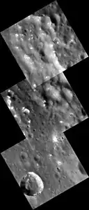 Hollows (irregular bright patches) in eastern Al-Hamadhani crater