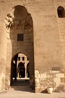 Example of portal topped by a semi-dome with muqarnas under it, at the Mosque of al-Nasir Muhammad (1318 and 1335)