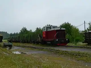 TU7-2083 with freight train