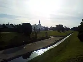 View of mosque from bridge over Dandenong Creek