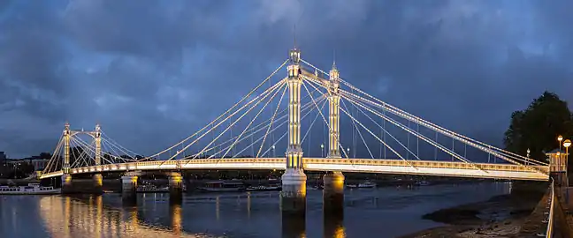 Image 42Albert Bridge, opened in 1873, crosses the River Thames between Chelsea and Battersea.