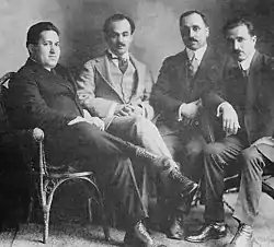 Four members of the Pen League in 1920. Left to right: Nasib Arida, Kahlil Gibran, Haddad, and Mikha'il Na'ima