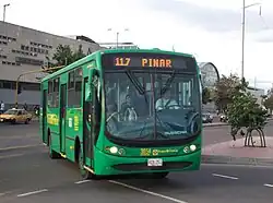 green Transmilenio feeder bus