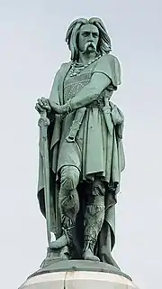 Statue atop monument