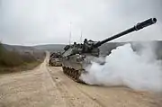 Dutch soldiers of Bravo Battery, Fire Support Battalion drive Panzerhaubitze 2000 into a simulated ambush.