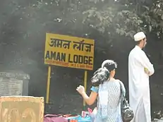 Man and woman waiting for a train