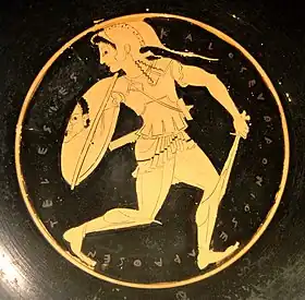 An Amazon with her shield bearing the Gorgon head image. Tondo of an Attic red-figure kylix, 510–500 BC