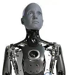 The Fourth Industrial Revolution in the 2020s is referred to as industrial change with emerging technologies such as AI, gene editing, and advanced robotics that blur the lines between the physical, digital, and biological worlds. Automation also continues to take over human jobs. Above is a photo of Ameca, the world's most advanced robotic humanoid, making public appearances between 2021 and 2023.