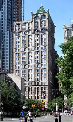 American Tract Society Building (1895–96), New York City. Miranda's angels support the globes at the corners of the penthouse.