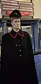 Post office: a mannequin of a post official in uniform with cap