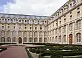 Former abbey of Val-de-Grâce in Paris: view on the cloister and its French formal garden