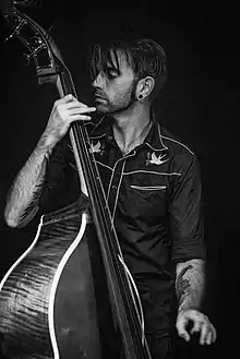 Photograph of Andy 'Rockin' Bones' Boyce playing double bass.