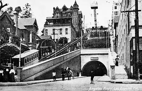 Low end view of the original Angels Flight with the 3rd Street Tunnel and an observation tower, c. 1905